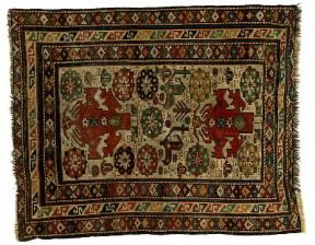 Tappeti caucasici. Un tappetto del tipo Sevan (Armenia) con la tinta rossa predominante.De Agostini Picture Library