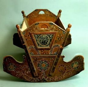 Culla altoatesina in legno decorato (Bolzano, Museo Civico).De Agostini Picture Library / A. De Gregorio
