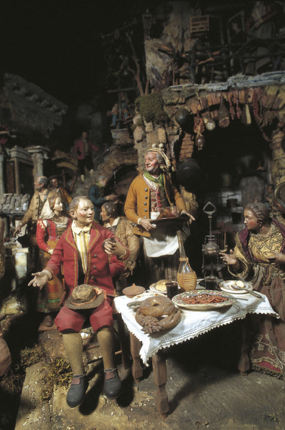 Presepe napoletano, scena di osteria Agli inizi del sec. XVI per iniziativa di San Gaetano di Thiene (considerato l'ideatore dei presepi popolari) si diffuse l'uso di ampliare la rappresentazione inserendovi personaggi secondari.